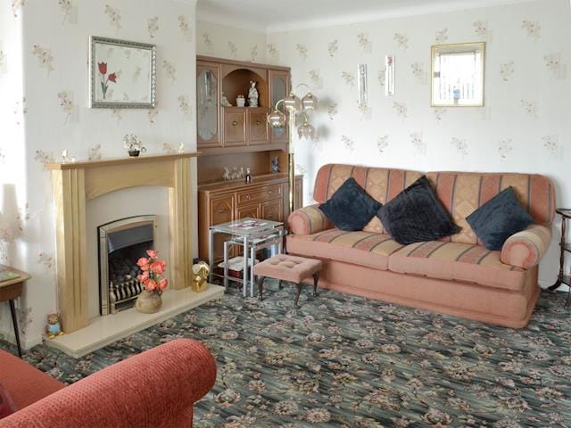 Comfy seating in living room | Rossall Beach Cottage, Rossall, near Thornton-Cleveleys.