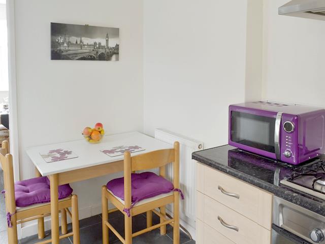 Convenient informal dining area in kitchen | Rossall Beach Cottage, Rossall, near Thornton-Cleveleys.