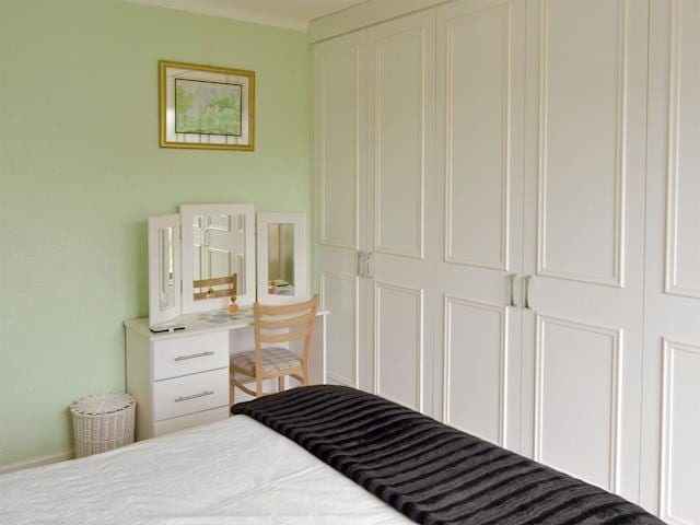 Ample storage and dressing area in double bedroom | Rossall Beach Cottage, Rossall, near Thornton-Cleveleys.