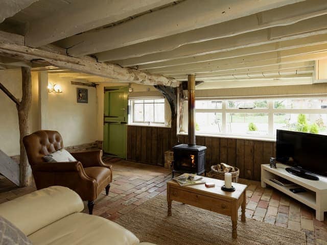 Quaint living area with wood burner | The Dairy - Green Valley, Ubbeston, near Halesworth