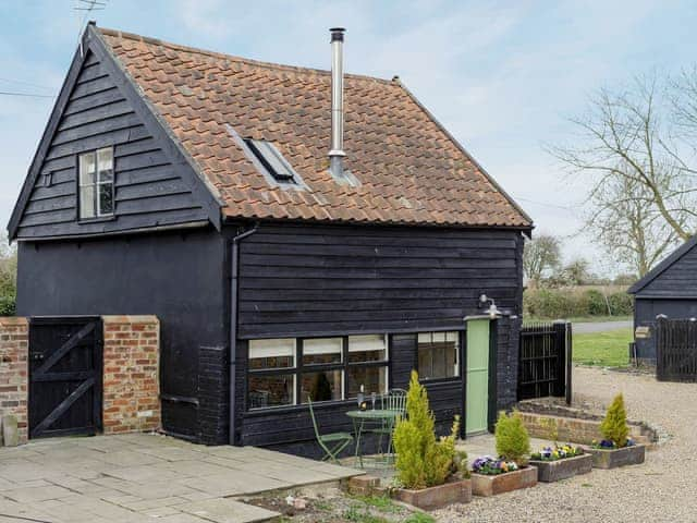 Courtyard with garden furniture and BBQ | The Dairy - Green Valley, Ubbeston, near Halesworth