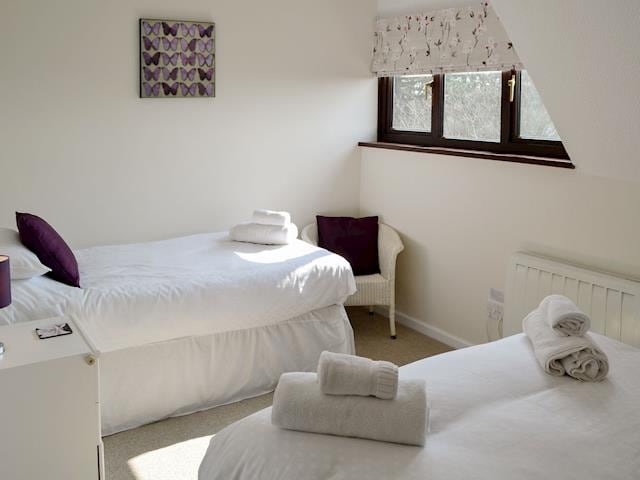 Double bedroom with an additional single | Villa 55, Cromer