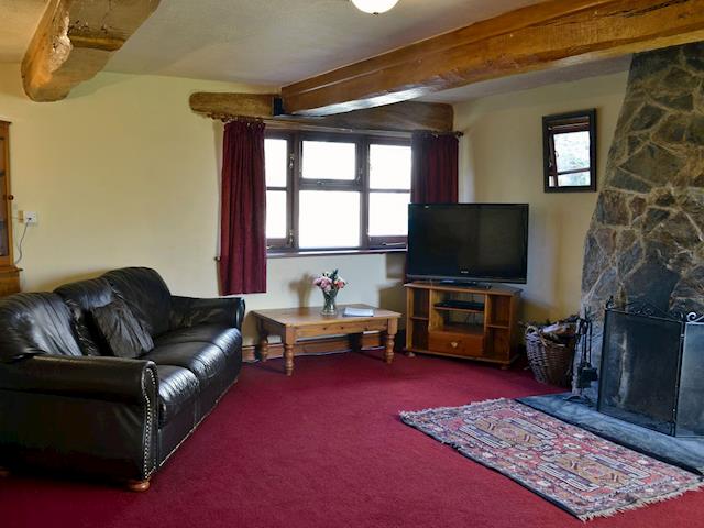 Warm and welcoming living room | Tarragon - Sherrill Farm Holiday Cottages, Dunterton, near Tavistock