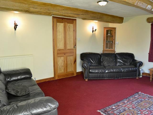 Warm and welcoming living room | Tarragon - Sherrill Farm Holiday Cottages, Dunterton, near Tavistock