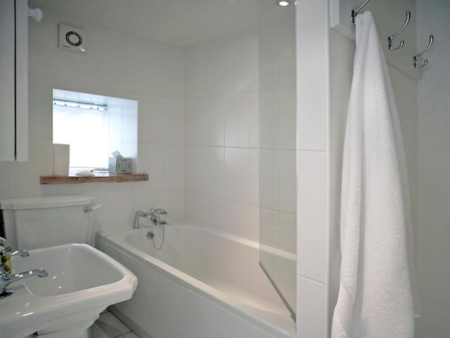 Bathroom with over-bath shower | Madeleine&rsquo;s Barn, Wells-next-the-Sea