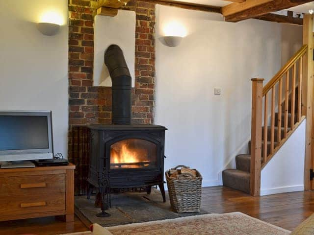 Cosy snug with wood burner | Cowford Oast, Eridge Green, near Tunbridge Wells