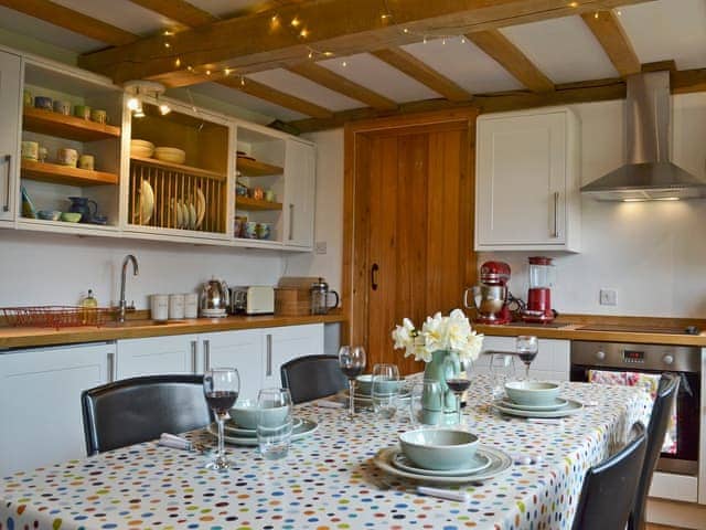 Stylishly furnished kitchen/dining room with beams | Cowford Oast, Eridge Green, near Tunbridge Wells