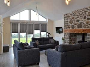 Light and airy living room with wood burner | Cerrig Sais, Rhosgadfan, near Caernarfon