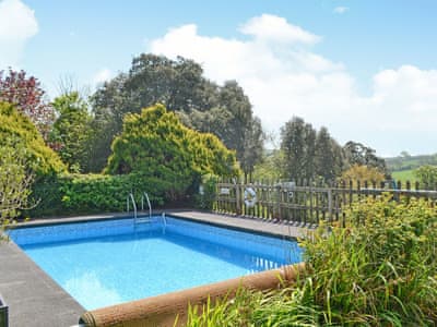 Wonderful outdoor swimming pool (shared with owner and other properties on-site) | Cloisters Cottage - Peregrine Hall Cottages, Lostwithiel