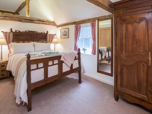 Beautiful double bedroom with gorgeous furniture | Pheasants Hill Old Byre, Hambleden, near Henley-on-Thames