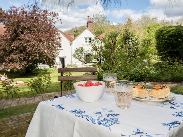 Wonderful spot in the garden for afternoon tea | Pheasants Hill Old Byre, Hambleden, near Henley-on-Thames