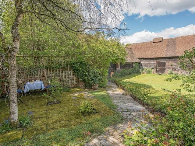 Shady peaceful area in the gorgeous garden | Pheasants Hill Old Byre, Hambleden, near Henley-on-Thames