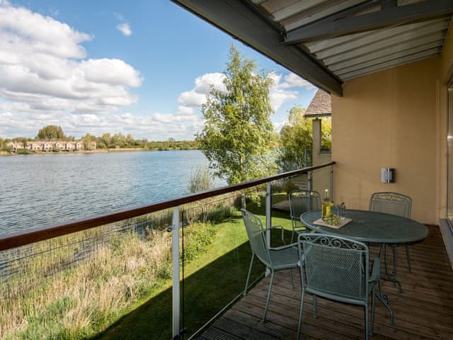 Balcony with lake view | The Augusta House, Somerford Keynes