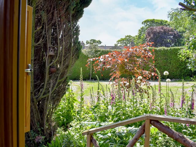 View overlooking the garden | Brandy Lodge - Tavern Cottages, Newsham, near Richmond