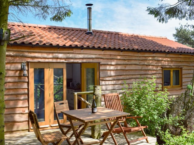 Patio doors leading to seating area | Brandy Lodge - Tavern Cottages, Newsham, near Richmond