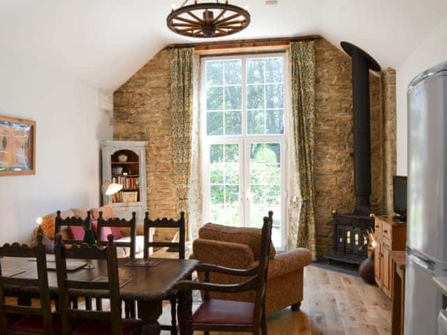 Wonderful open plan living space with wood burner | Stable Cottage - Peregrine Hall Cottages, Lostwithiel