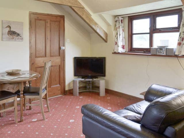 Cosy living area | Sage - Sherrill Farm Holiday Cottages, Dunterton, near Tavistock