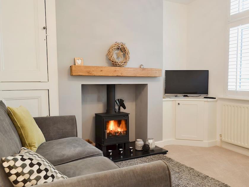 Cosy living room with multi fuel burner | Cottage on the Green, Acomb, near York