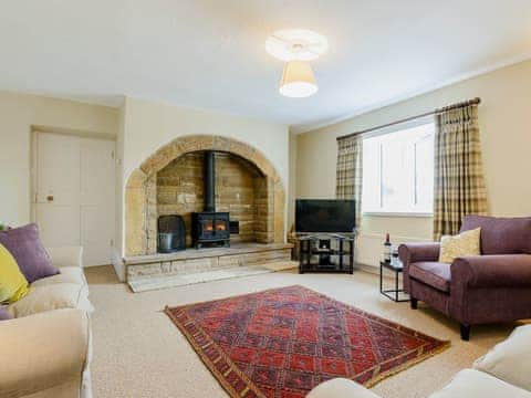 Large and airy living room with wood burner | Backstone Bank Farmhouse, Wolsingham, near Stanhope