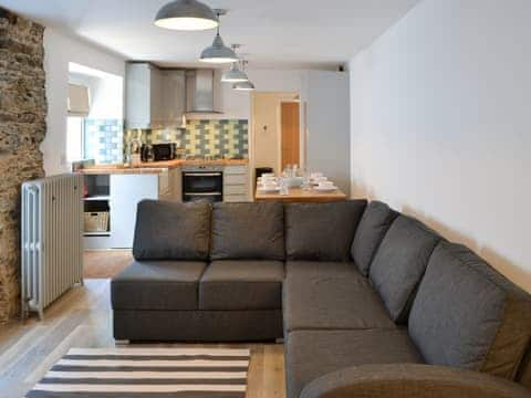 Spacious living area with contemporary lighting | Rosetta ApartmentsOcean Mist, Newquay