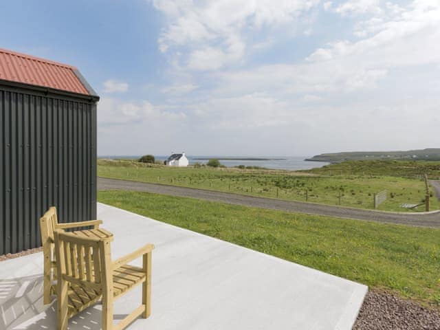 Fabulous view from the patio | Quiraing - Brogaig Cottages, Brogaig, near Staffin