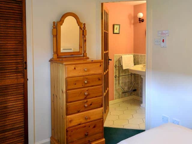 Double bedroom with en-suite shower room | Bizzie Lizzie Cottage - Akeld Manor, Akeld, Wooler