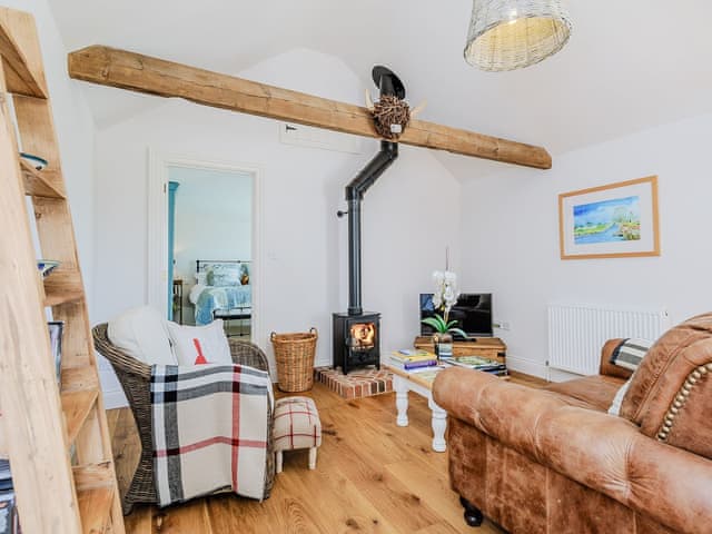 Open plan living space with wood burner | The Bull Pen, Lawford