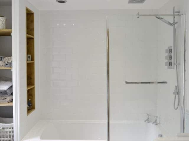 Family bathroom with shower over bath | Little WarhamLittle Warham Cottage, Beaford, near Torrington