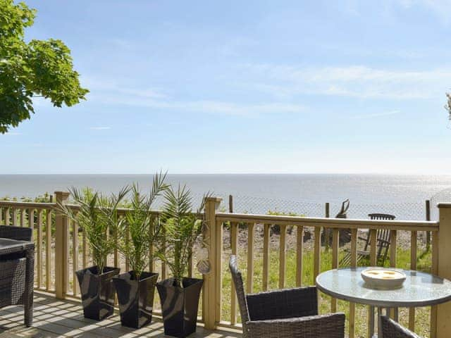 Decked seating area overlooking the sea | Seacliff, Corton, near Lowestoft