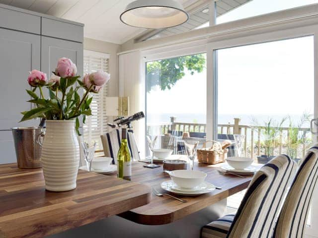 Inviting dining area of convenient open-plan living space | Seacliff, Corton, near Lowestoft