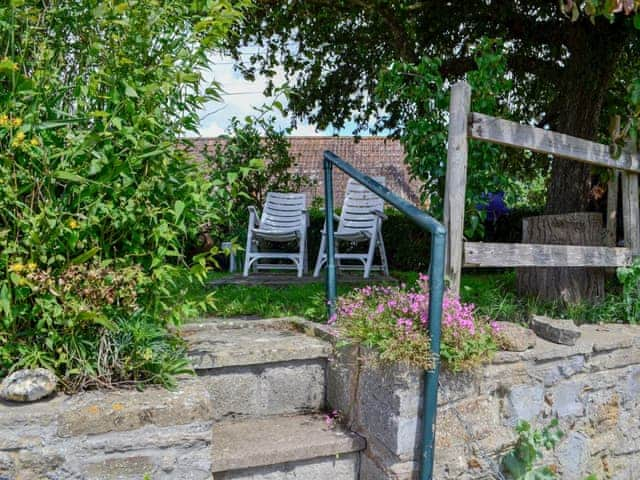 Charming garden with raised lawn and shady seating area | The Annexe at Russets, Isle Brewers, near Taunton