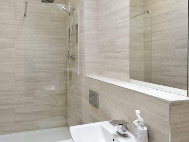 Family bathroom with shower cubicle and corner bath | Sunflower Cottage - Hoxne Cottages, Strensall, near York