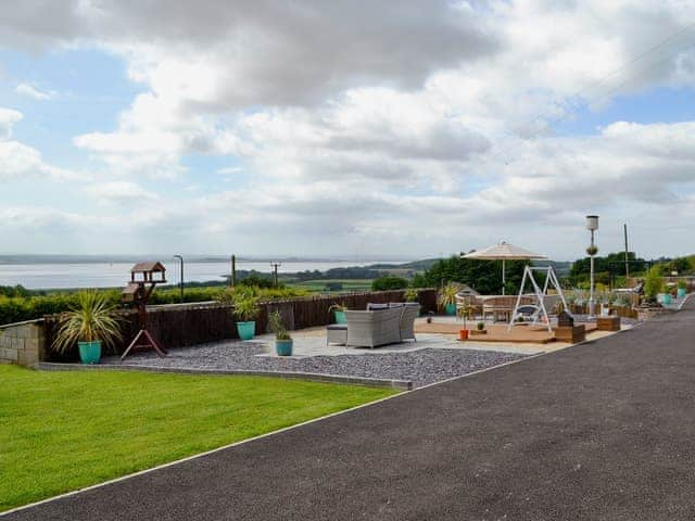 Relax and admire the view from the terrace | The Outlook - Underwood Farm, Stroat, near Chepstow