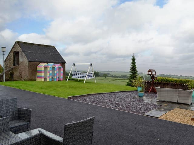 Lovely garden with many private places to sit and enjoy the view | The Retreat - Underwood Farm, Stroat, near Chepstow