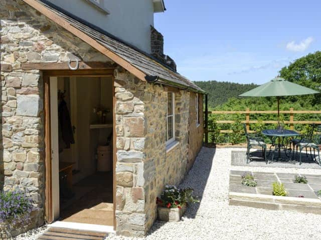 Patio with garden furniture and barbecue | Little WarhamLittle Warham Cottage, Beaford, near Torrington