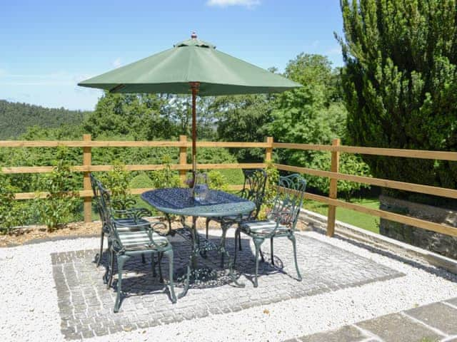 Patio with garden furniture and barbecue | Little WarhamLittle Warham Cottage, Beaford, near Torrington