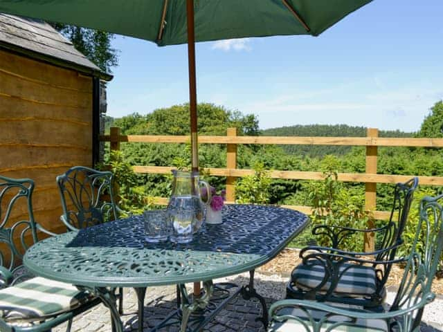 Patio with furniture and fantastic views | Little WarhamLittle Warham Cottage, Beaford, near Torrington