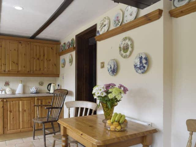 Intimate dining area within kitchen | Tillet Cottage, Oulton Broad, near Lowestoft