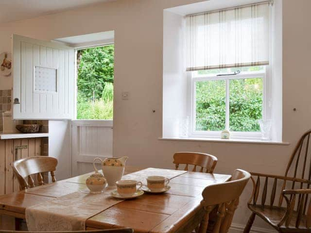 Convenient dining area within large kitchen | Roundhill Cottages 1, Grasmere