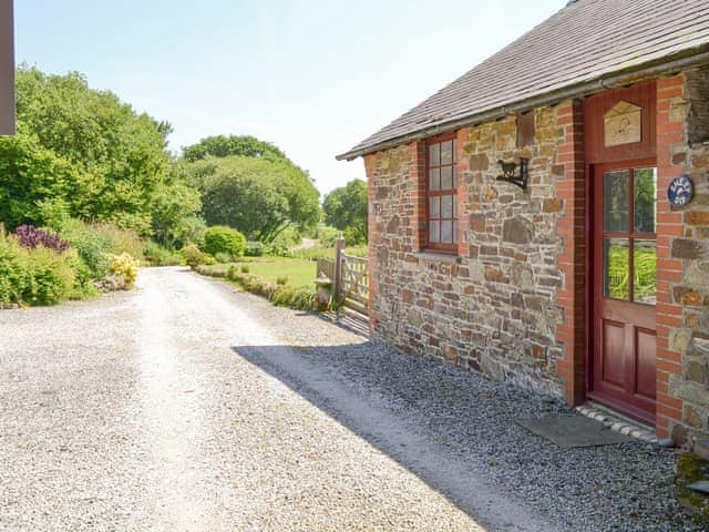 Exterior of swimming pool | Stowford Lodge Holiday Cottages, Langtree, near Great Torrington