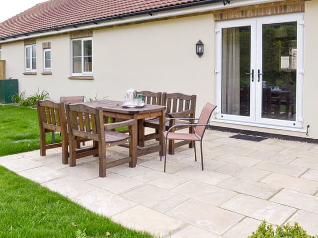 Paved patio area with outdoor furniture | Old Dairy - Andover Lane Farm, Faberstown, near Andover