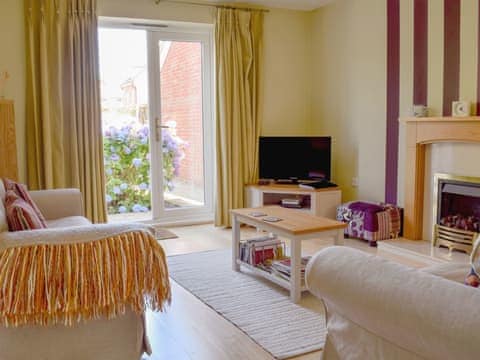 Comfortable living room | Riverside Cottage, Evesham