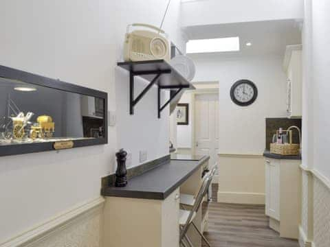 Galley style kitchen with dining area | The Little House, York