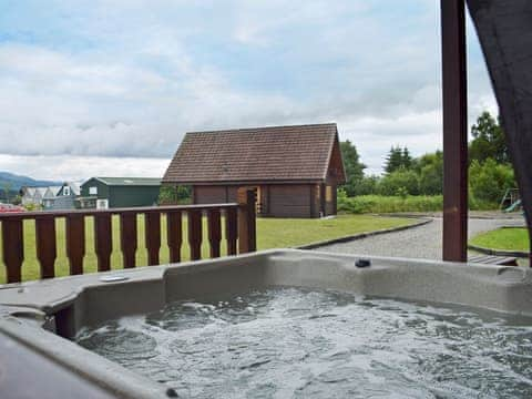 Relaxing hot tub | Lodge 3 - Benview Holiday Lodges, Balfron, near Aberfoyle