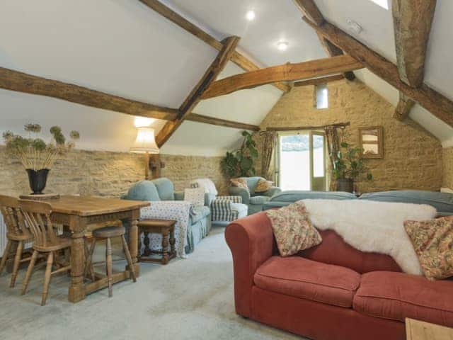 Thoughtfully renovated living/dining room | Flowers Barn, Middle Duntisbourne, near Cirencester