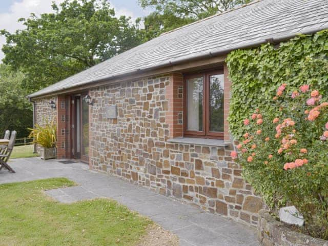 Paved patio area to front of property | Millers Rest - Burracott Farm, Poundstock, Bude