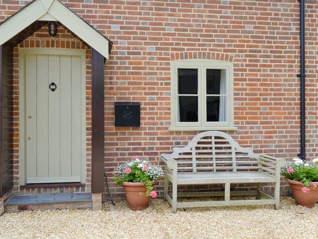 Charming entrance with outdoor seating | Pond Cottage, Boldre, near Lymington