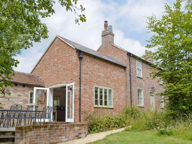 Rear of property with terrace | Pond Cottage, Boldre, near Lymington