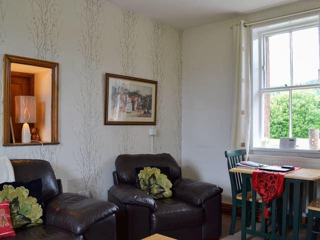 Cosy living area with original features | Ticket Office - Torver Station Cottages, Torver, near Coniston