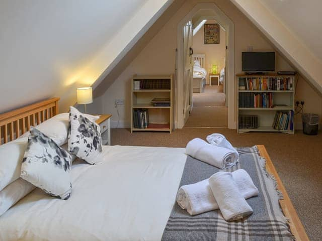 Lovely large double bedroom with sloping ceiling | Middle Cottage, Shilbottle, near Alnwick